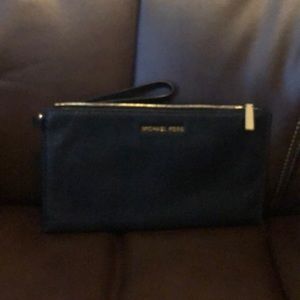 Black leather Michael Kors wristlet